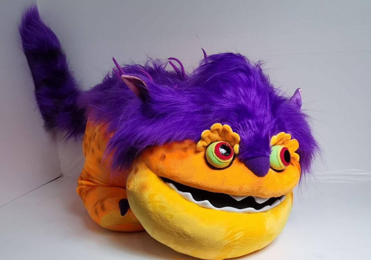 Orange monster plush, big grin Orange monster plush with a huge grin, white teeth and a blue tongue, purple tail behind, handmade Big Orange