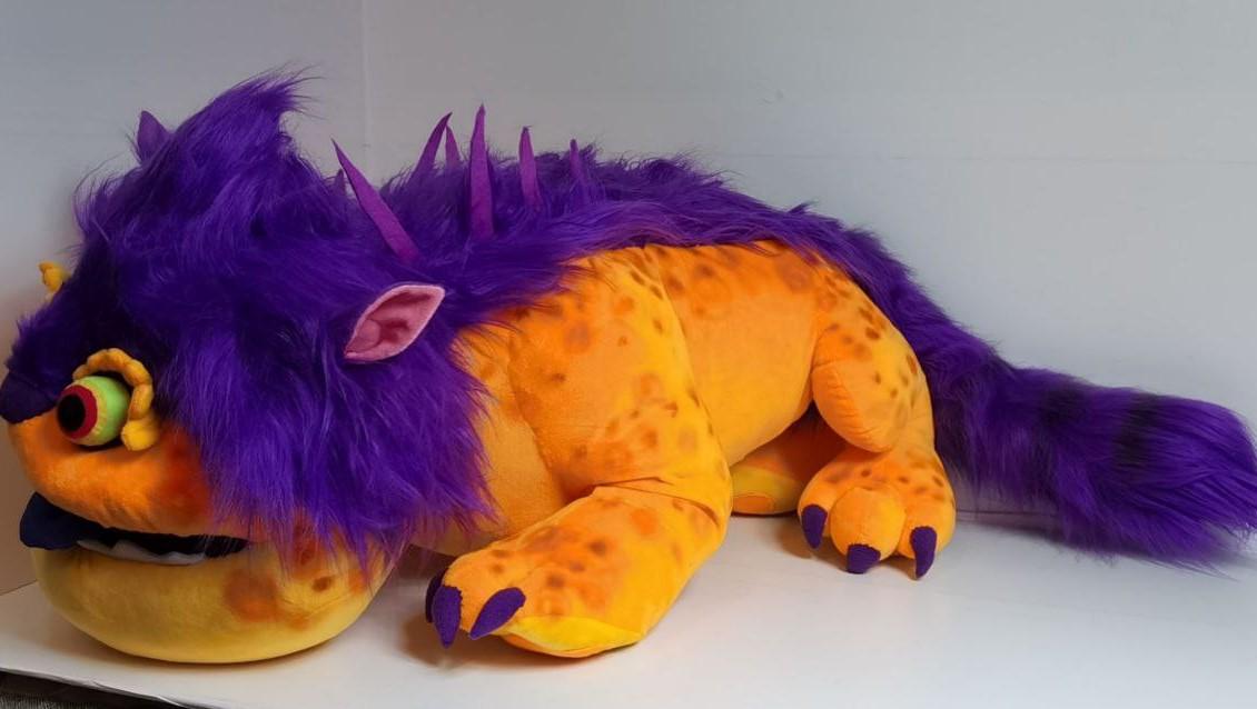 Orange monster plush, spotted body Orange monster plush lying flat with a spotted orange body, pink ear and purple fur, Big Orange sewn to order