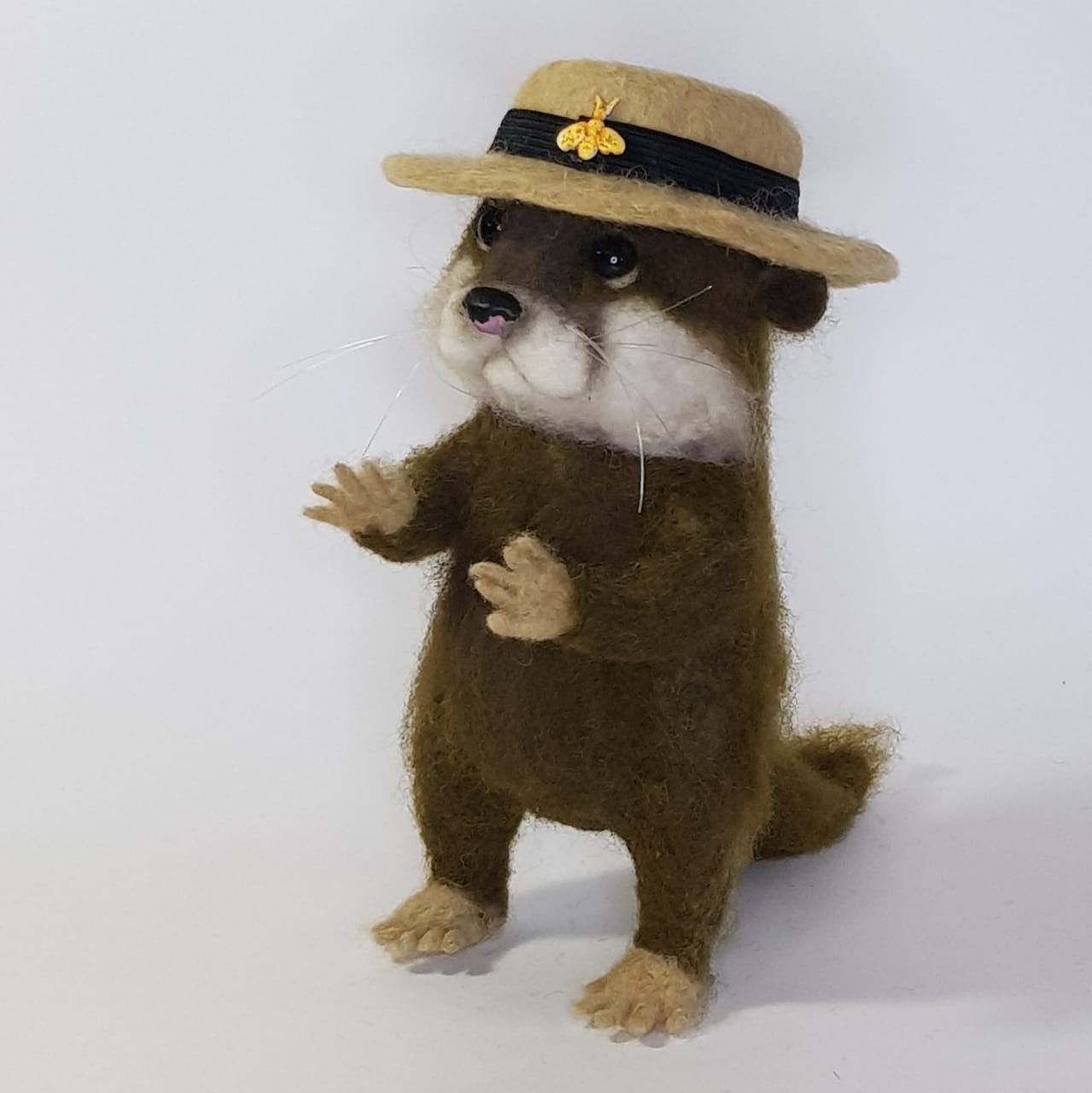Otter plush with a long felted tail Custom otter plush with a long thick tail and white chin, felted wool boater with a black band, handmade