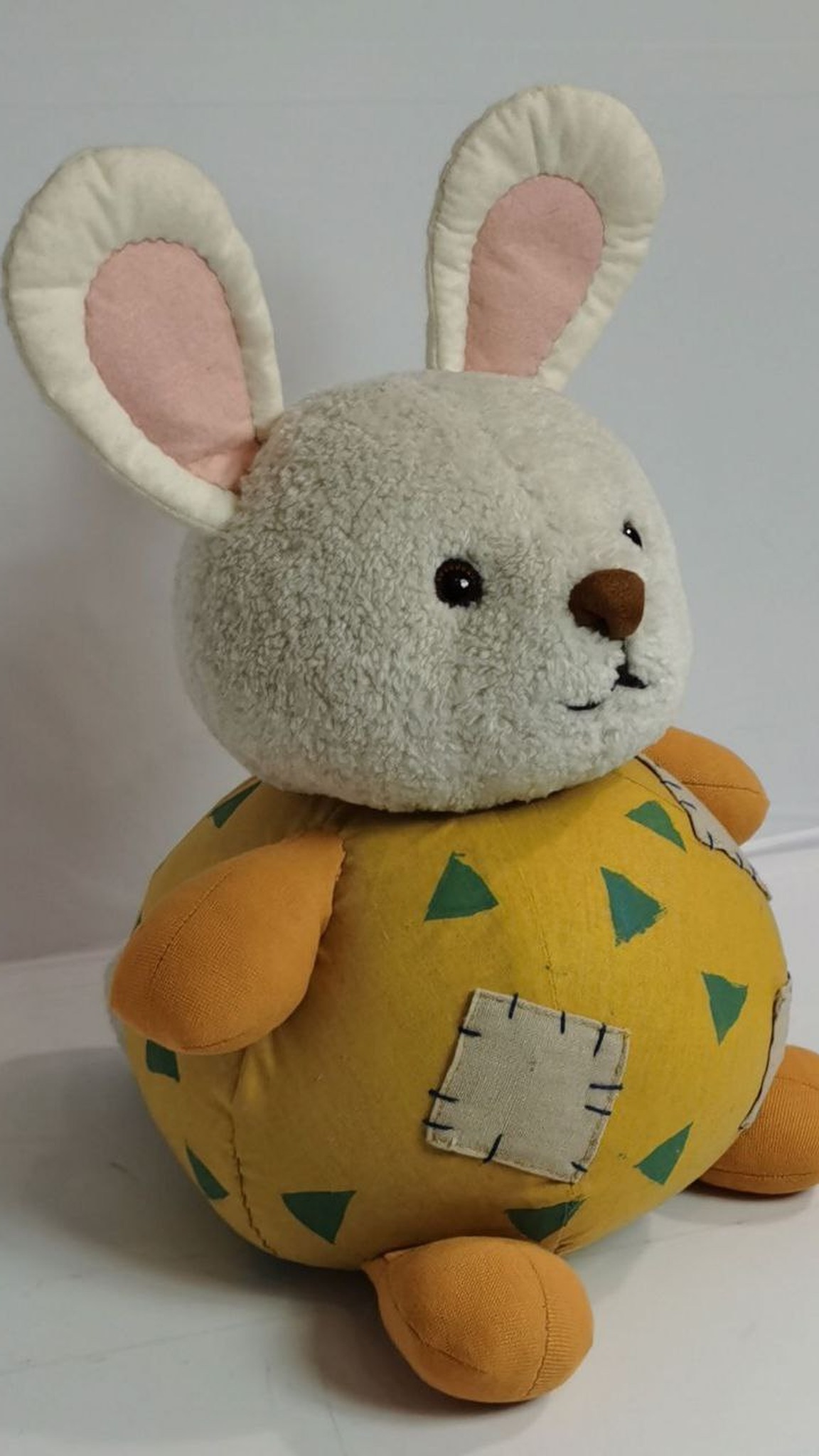 Patchwork bunny plush with cream patches stitched by hand on a yellow tummy, custom made to order