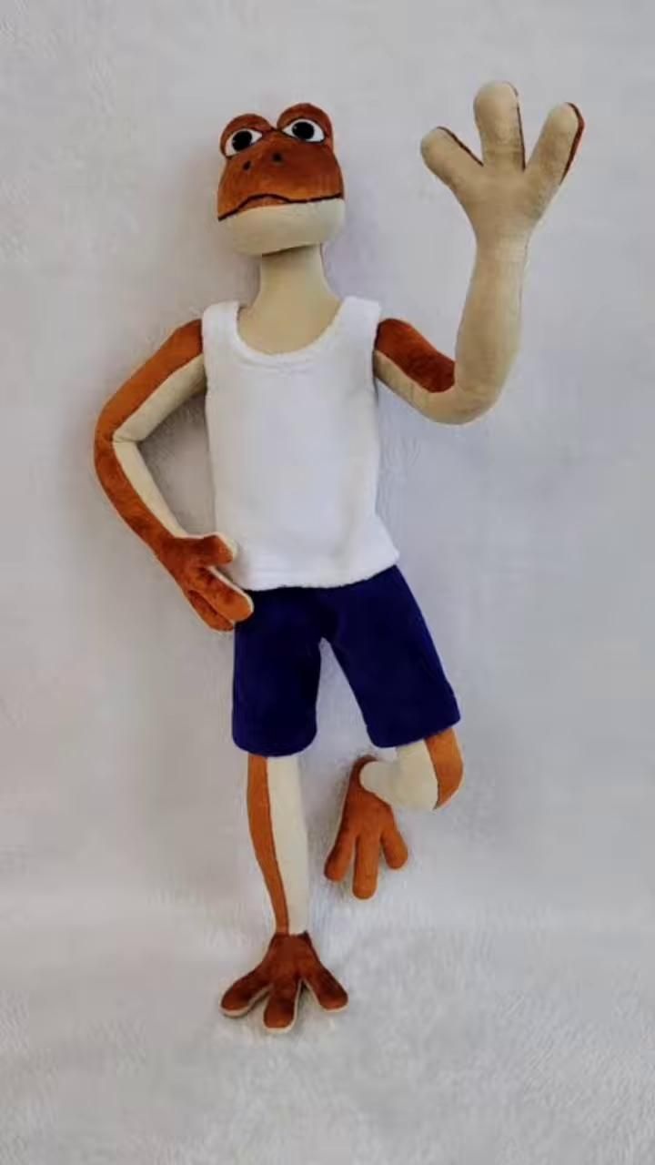 Patila frog plush waving Patila frog plush from the orange frog dance waving with a cream hand, custom made by hand