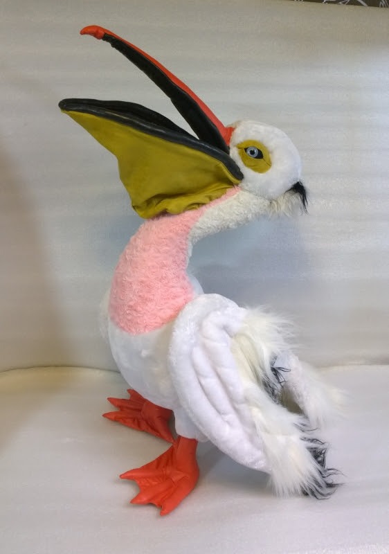 Pelican plush with its beak open Pelican plush pointing its open beak up, mustard pouch and pink chest, white faux fur wings, made to order