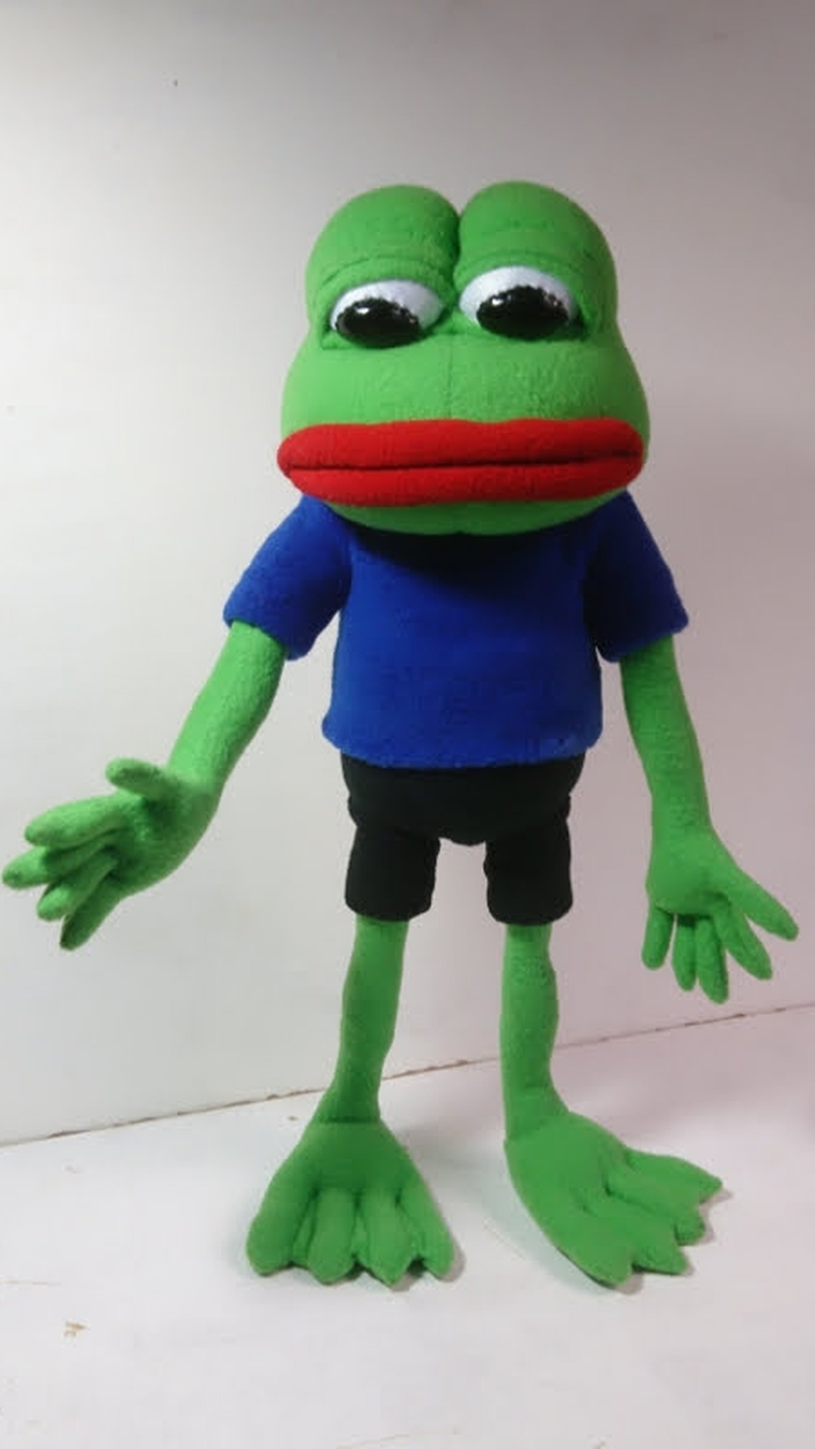 Custom Pepe meme frog plush with heavy eyelids, long arms and five-fingered hands, made to order