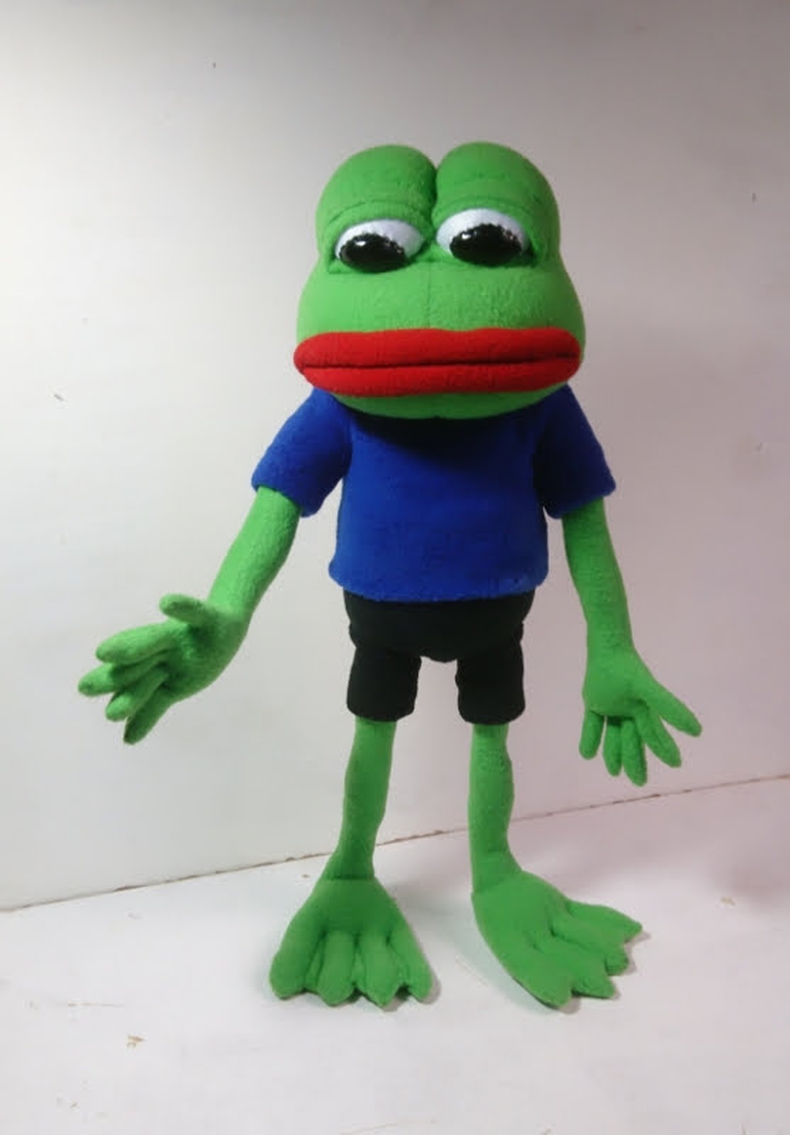 Pepe the Frog plush in a blue T-shirt and black shorts Pepe the Frog plush standing on big webbed feet, blue T-shirt, black shorts and red lips, handmade to order