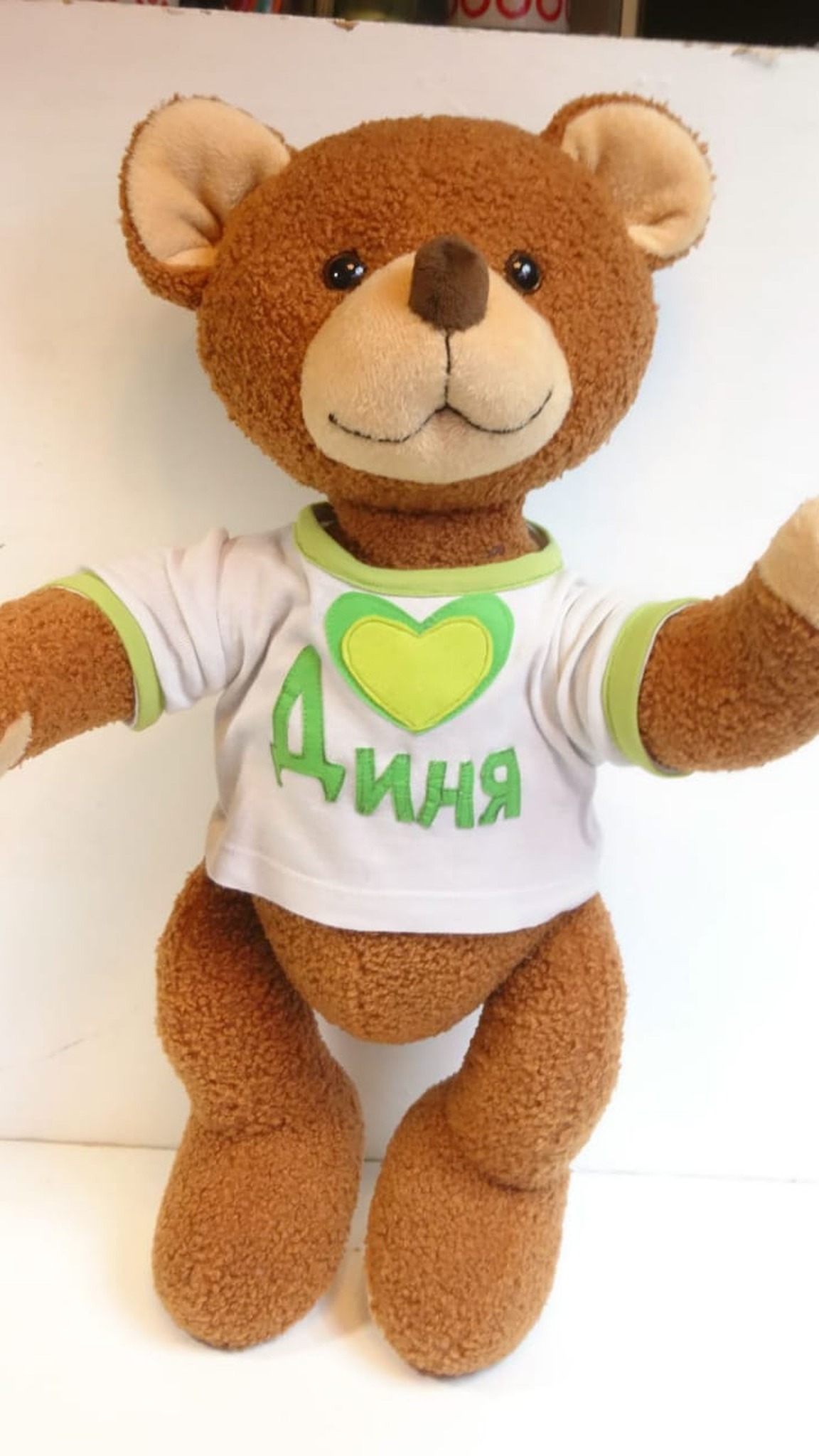 Personalized teddy bear standing in a T-shirt with a heart and the name Dinya, brown faux fur, made to order
