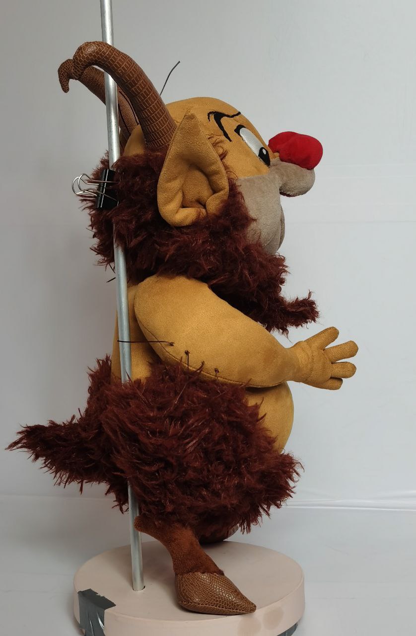 Phil Hercules plush, horns and red nose Custom Phil Hercules plush with curved brown horns, a red nose and a round tan belly, made to order