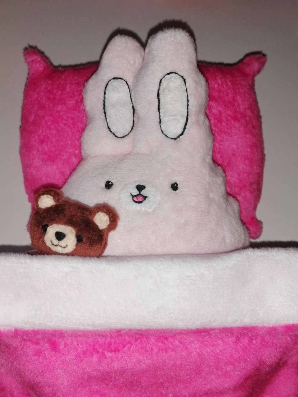 Pink bunny plush tucked into bed Pink bunny sticker plush tucked into a hot-pink bed with a little teddy bear, custom toy made to order