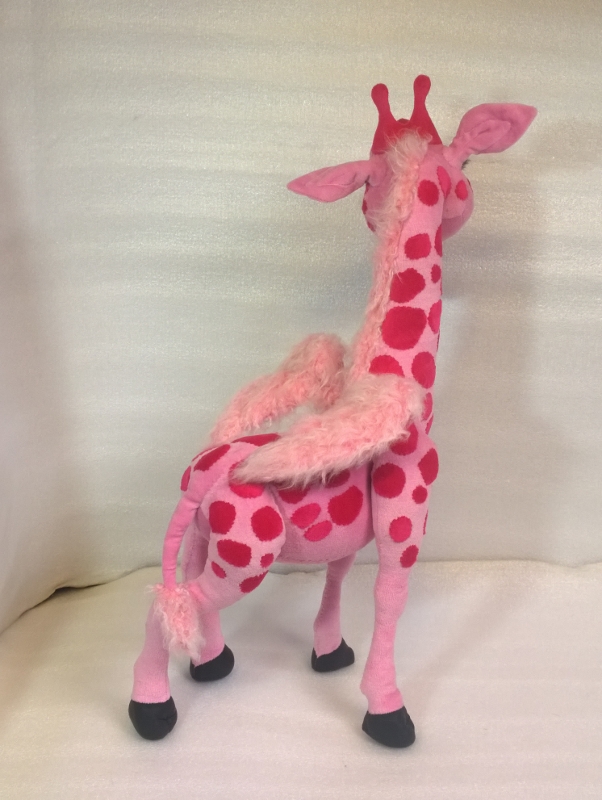 Pink giraffe stuffed animal with faux fur wings Pink giraffe stuffed animal made to order, with pale pink faux fur wings, mane and tail tuft on a spotted back