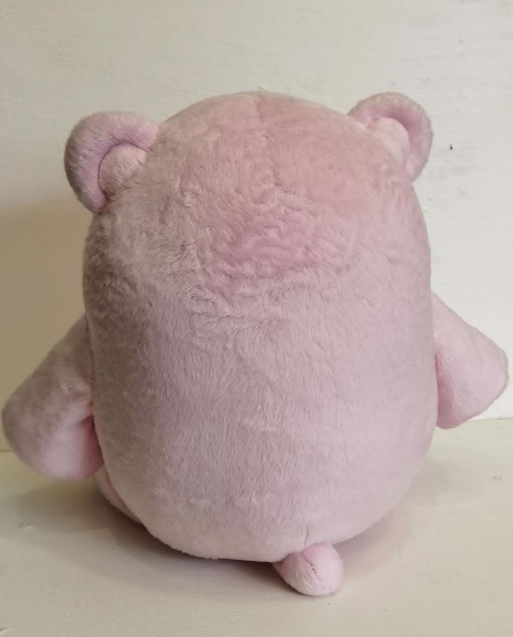 Pink teddy bear plush with a tiny tail Pink teddy bear plush from Toy Story with a round back and a tiny tail, sewn by hand to order