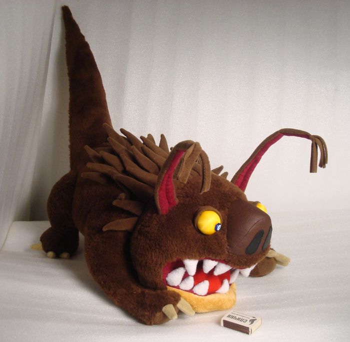 Pirozhok monster plush with a spiky crest Pirozhok monster plush sewn to order: brown faux fur body, suede spike crest, tall pointed tail and pale claws