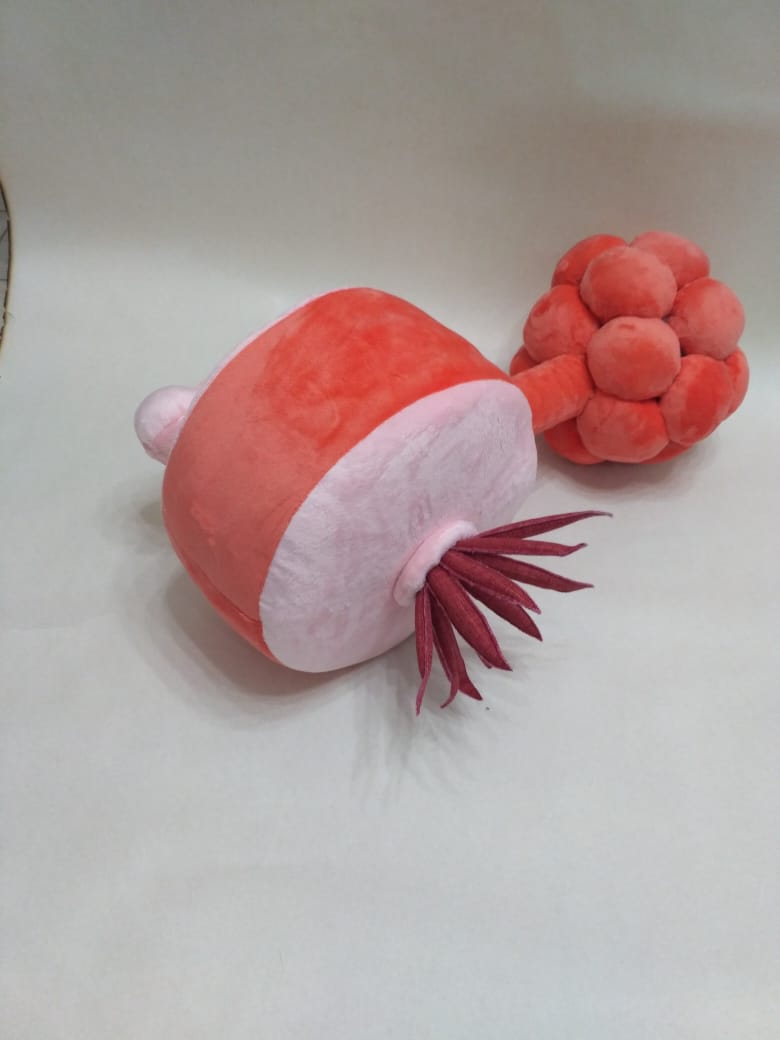 Plumbus plush with spikes and handle Rick and Morty plumbus plush lying down, pale pink drum end, red spikes and curled handle, custom made to order