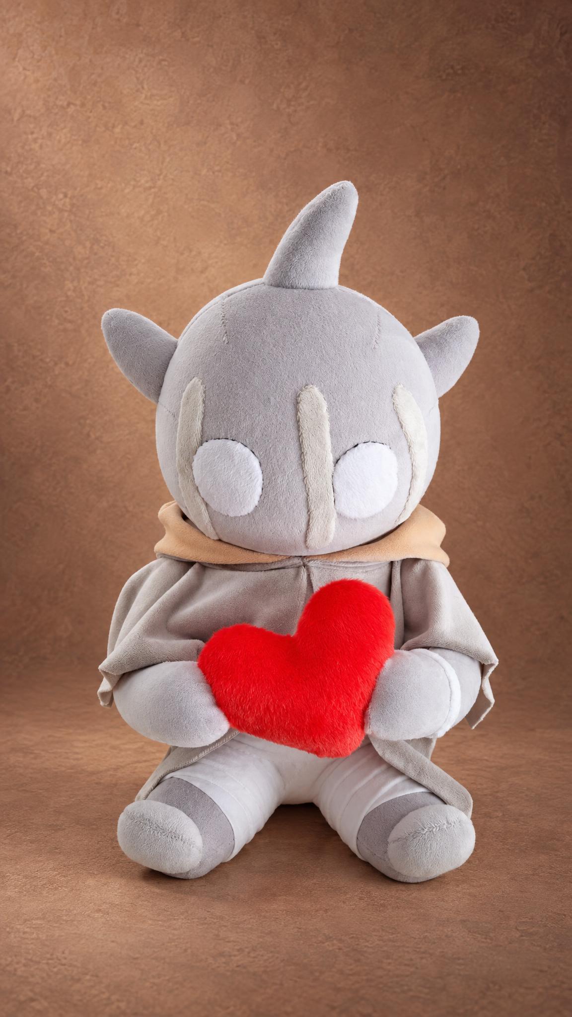 Custom monster plush with horns and round white eyes hugging a fluffy red heart, sewn to order from a drawing