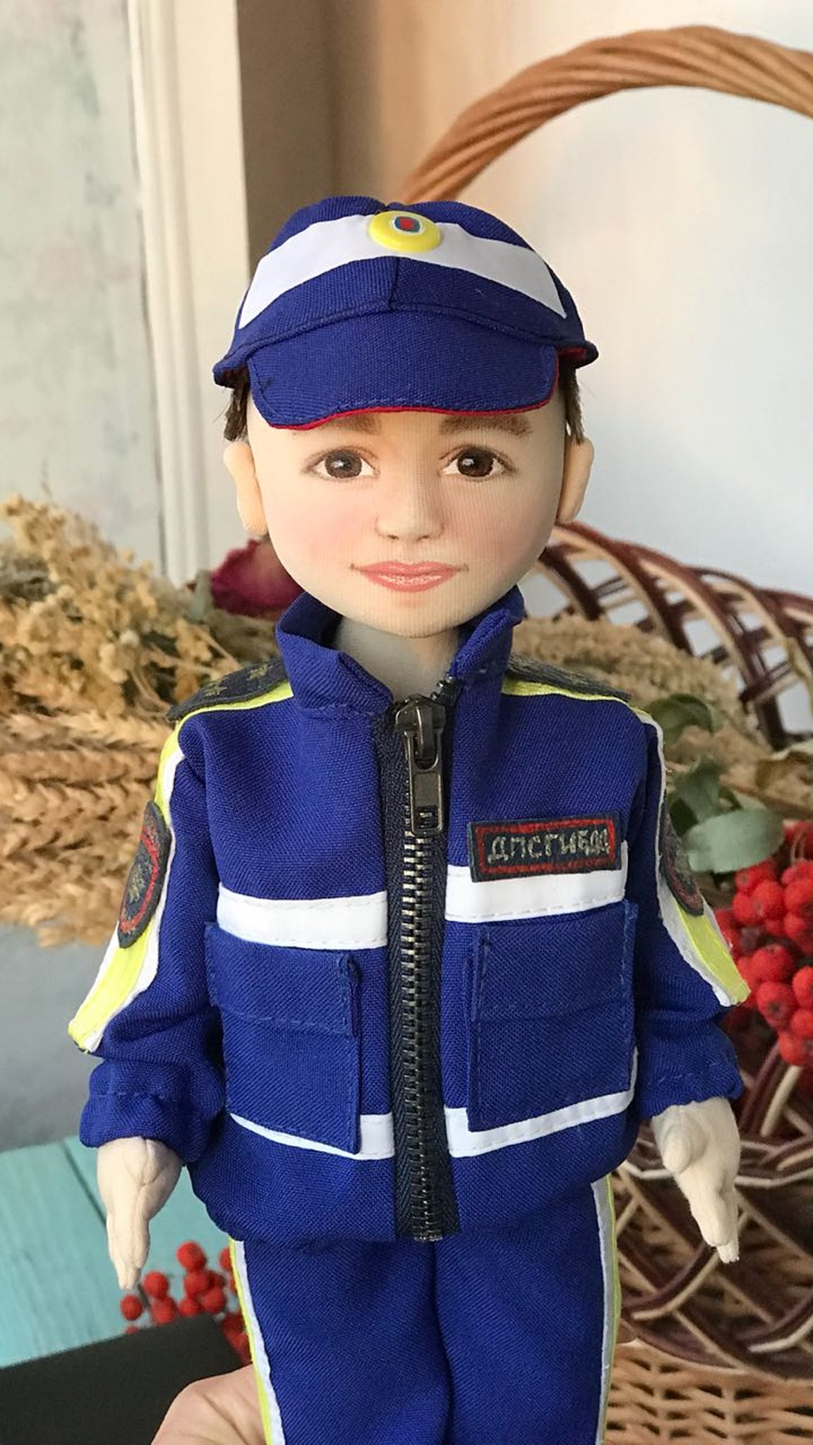 Police officer doll made to order as a birthday gift: zip jacket, starred epaulettes, reflective stripes