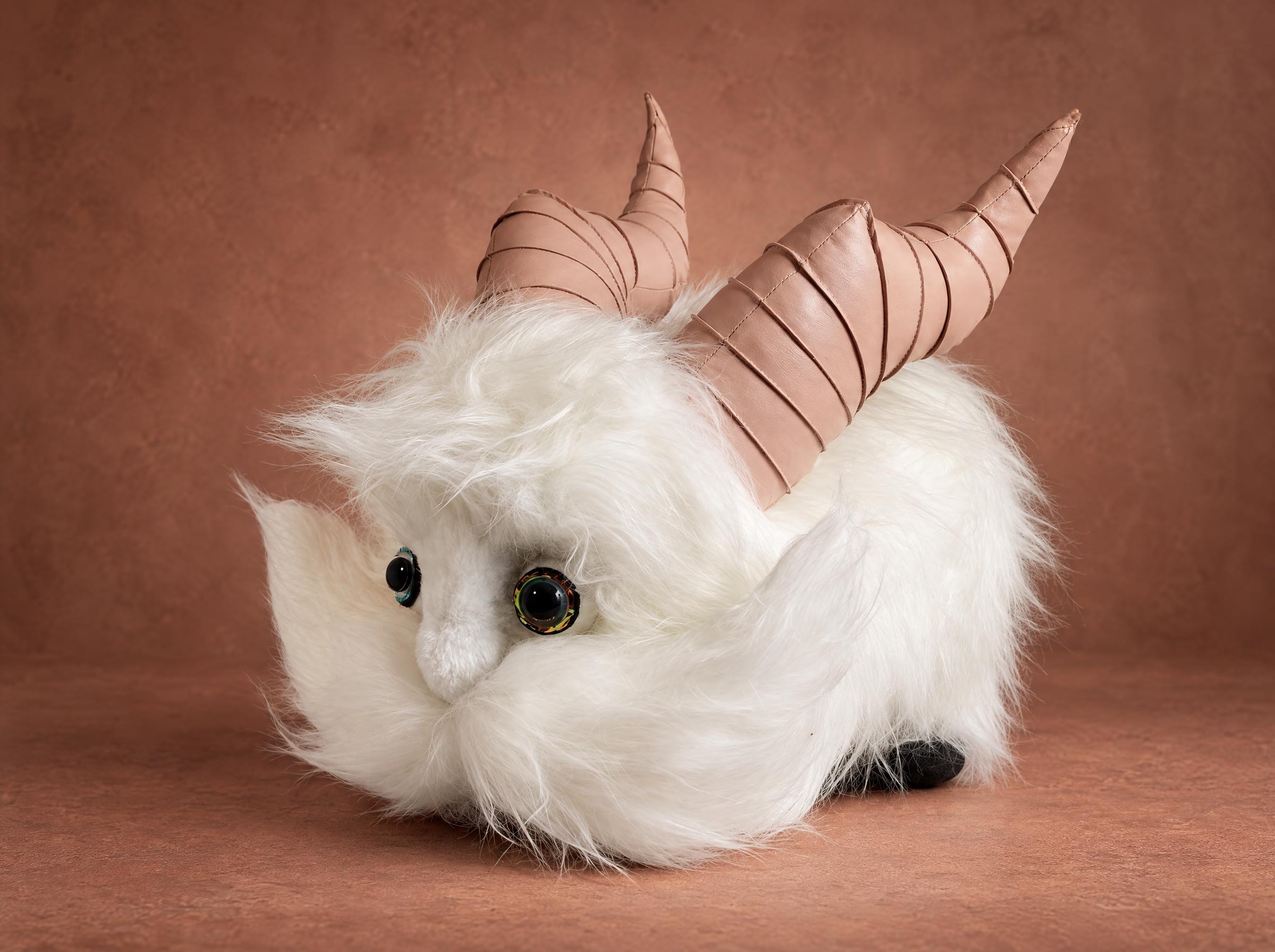 Poro plush from League of Legends in long white faux fur with spiral faux leather horns, handmade to order