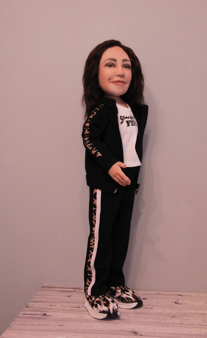 Portrait doll in a tracksuit Handmade portrait doll of a woman: black track pants with white and leopard stripes, leopard-print sneakers