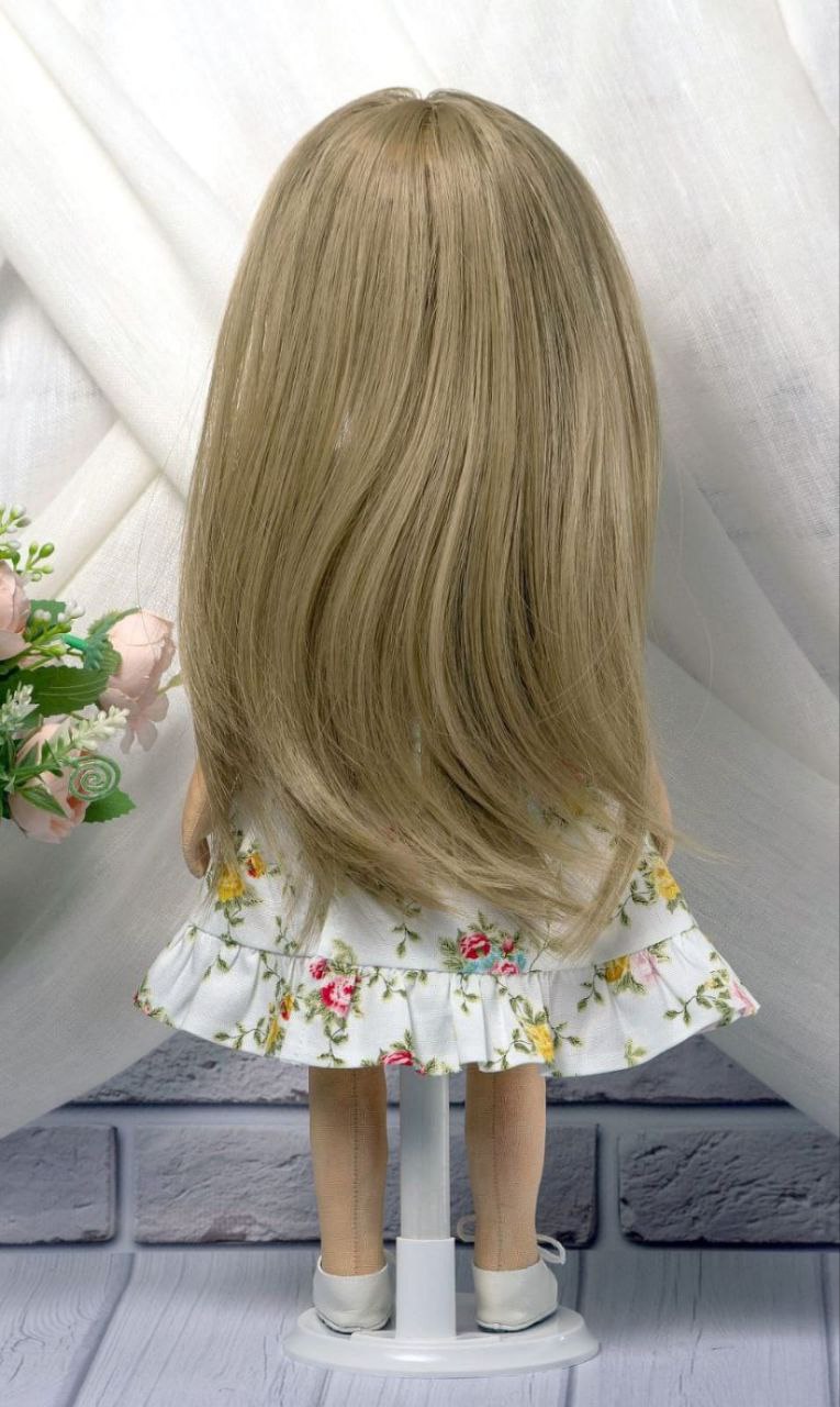 Portrait doll with long dark-blonde hair Long straight dark-blonde hair on a custom girl portrait doll in a ruffled rose-print dress, handmade to order