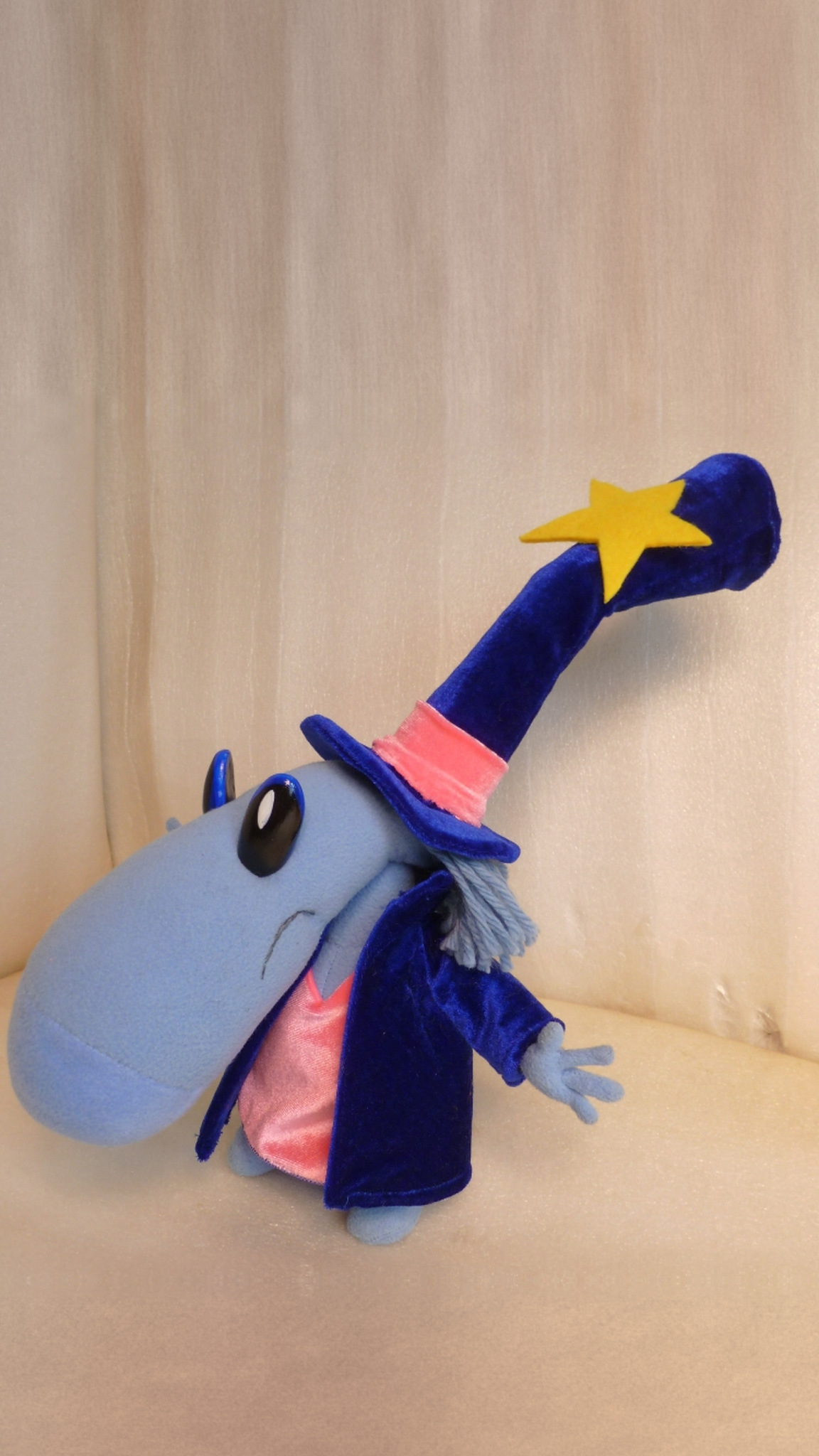 Posable Rayman Magician Teensy plush, arms spread wide, yarn hair and blue star top hat, custom made to order
