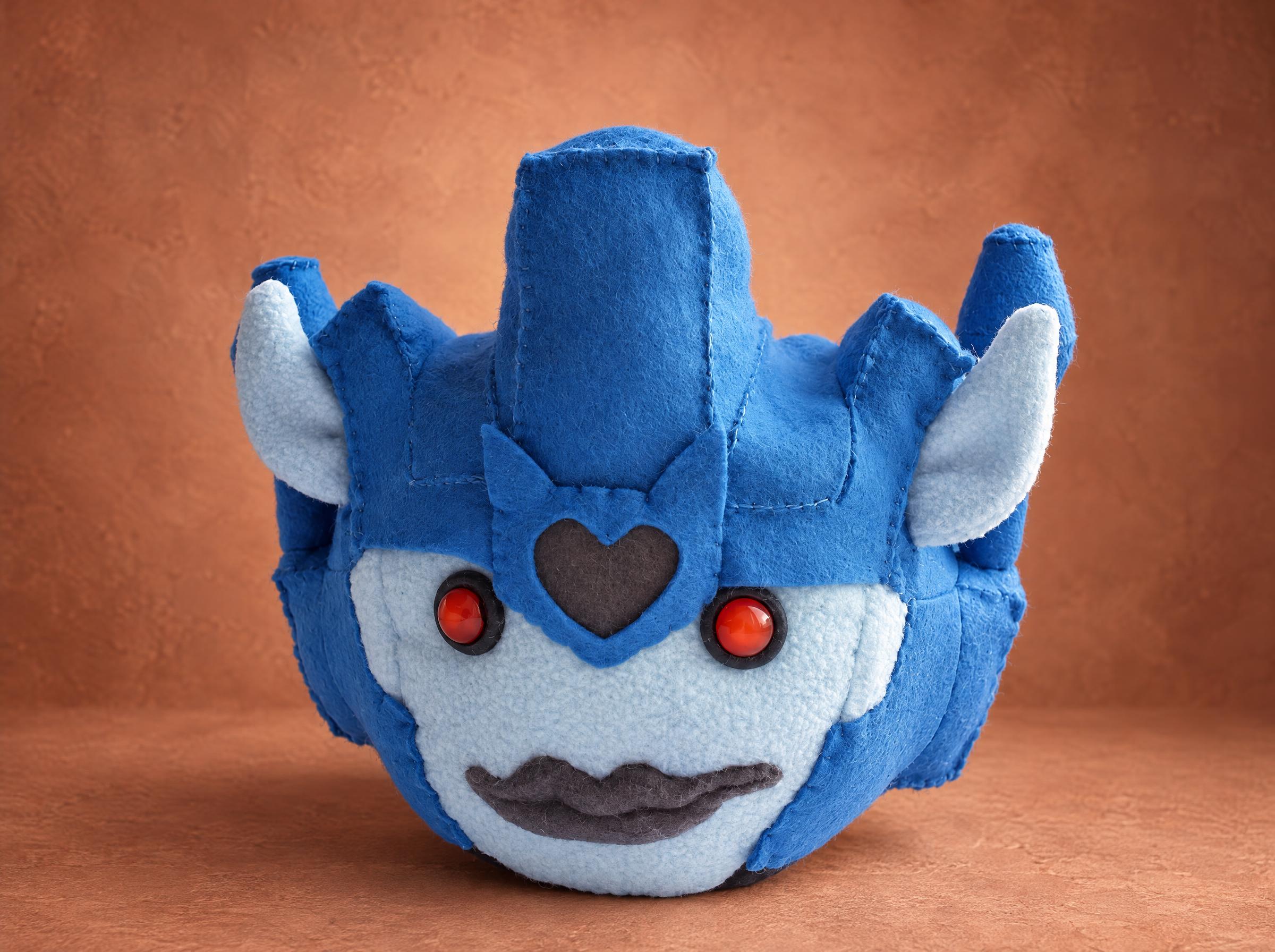 Puggleformer Transformers plush head in blue felt with red eyes and pug lips, handmade to order from a drawing