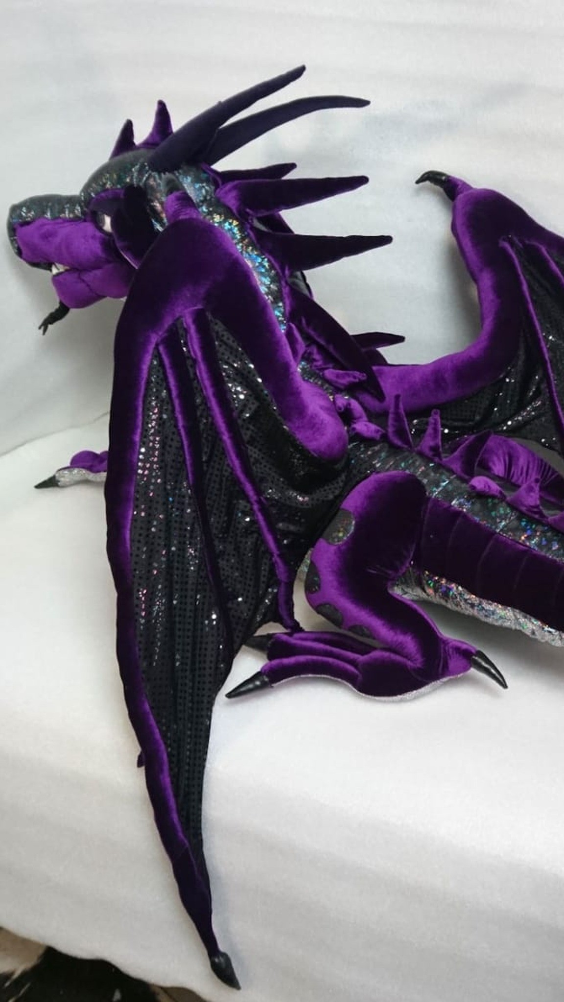 Custom purple dragon plush with black glitter bat wings and velvet edges, sewn by hand to order