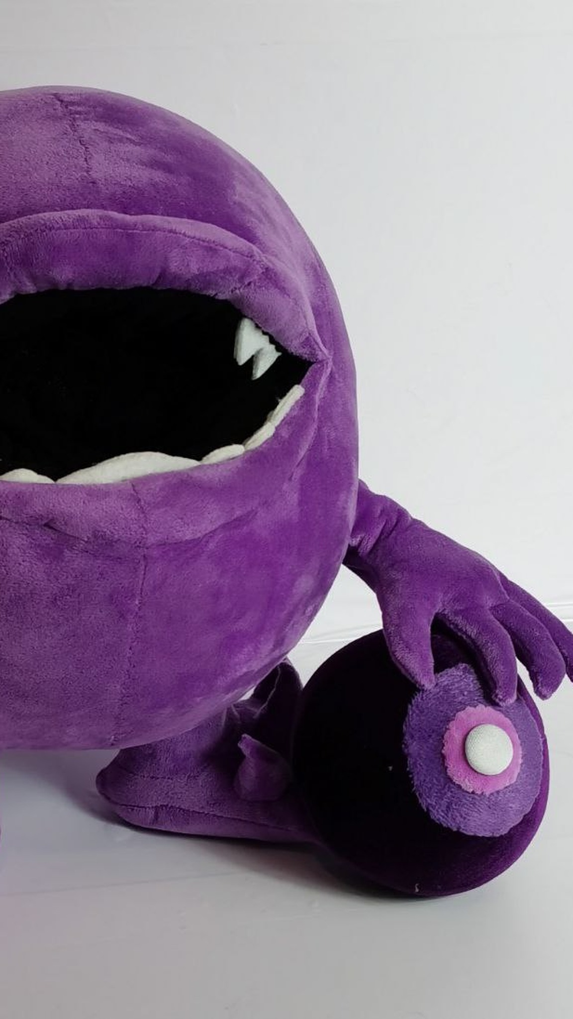 Purple monster plush with the ball taken out of its mouth, a removable part, custom made to order
