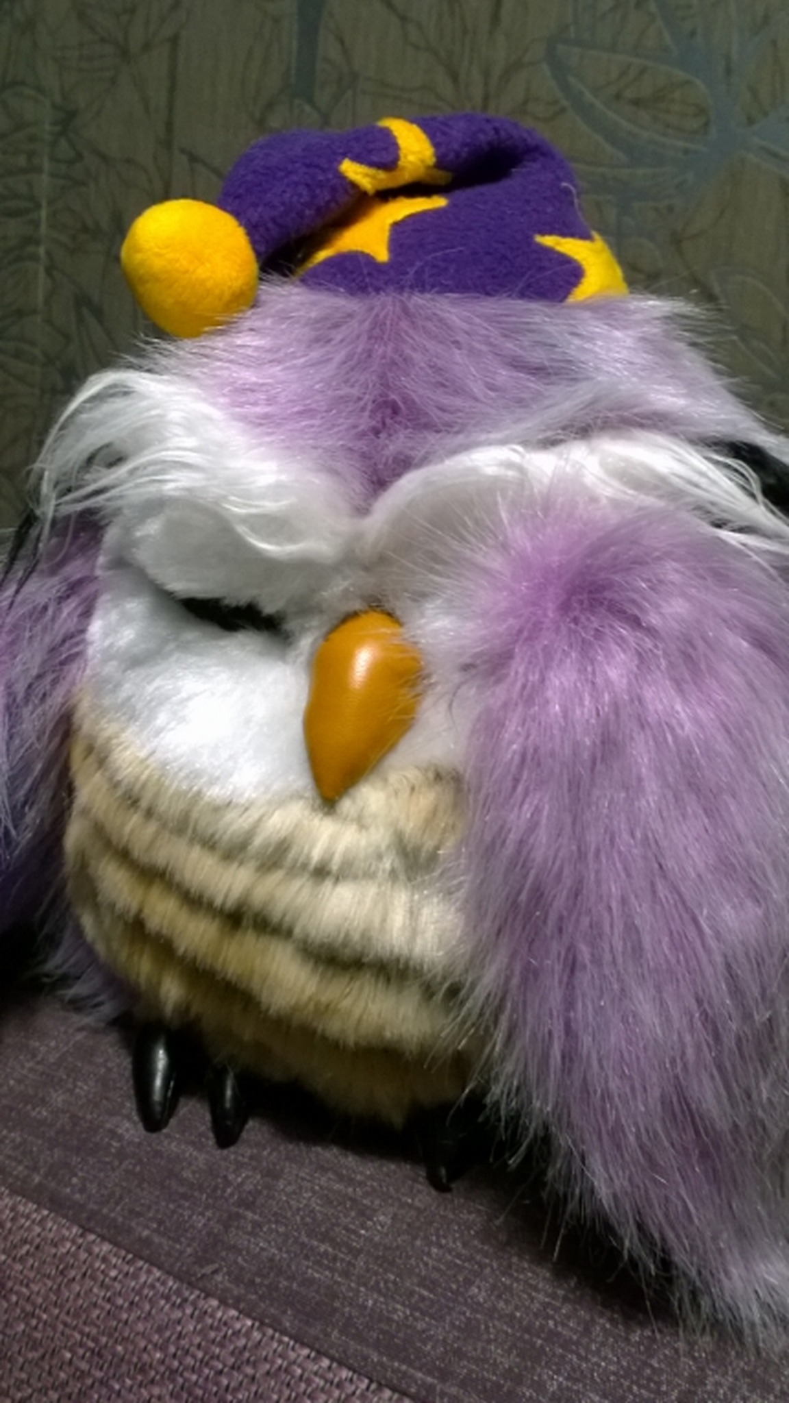 Purple owl plush with closed eyes and an orange beak, faux fur wings over its belly, custom owl made to order