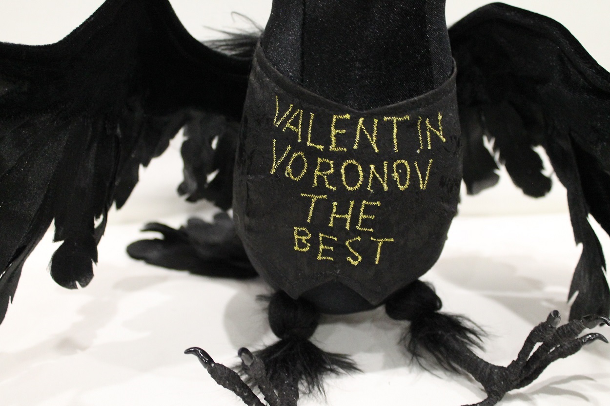 Raven plush with a hand-painted vest Raven plush with spread wings and a black vest with hand-painted gold lettering, a custom gift made to order