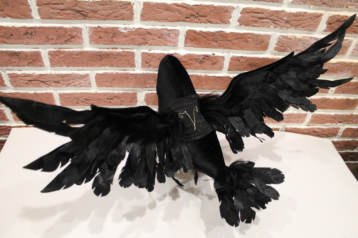 Raven plush with wings spread Raven plush with wings spread wide and a gold initial on its vest, a custom velvet bird made to order