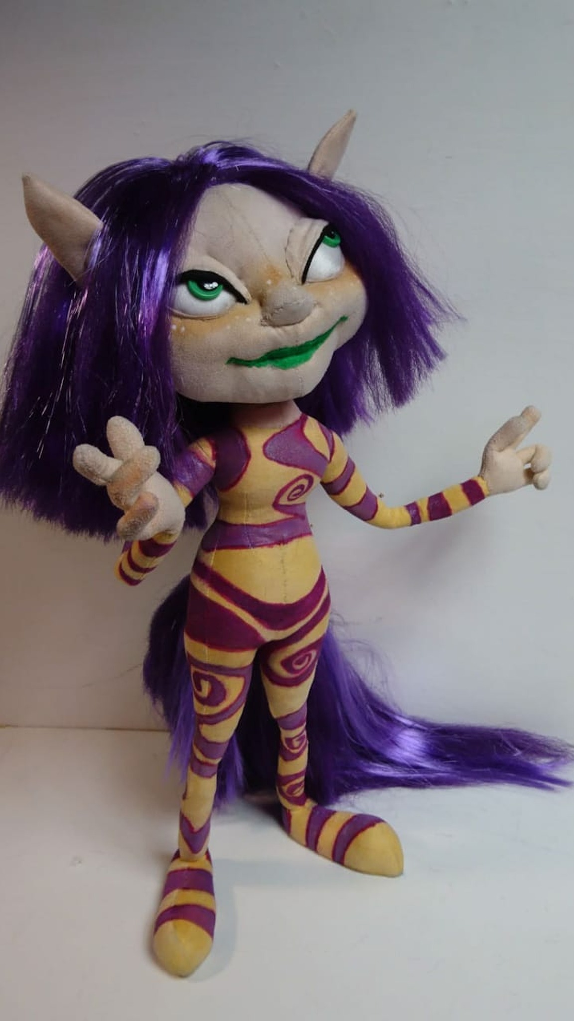 Rayman Ly plush in a hand-painted stripe and spiral suit with long purple hair, custom made to order