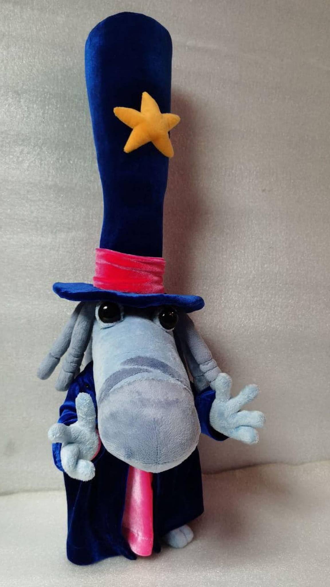 Rayman Magician plush standing tall in his blue velvet top hat with a yellow star, a Teensy sewn to order