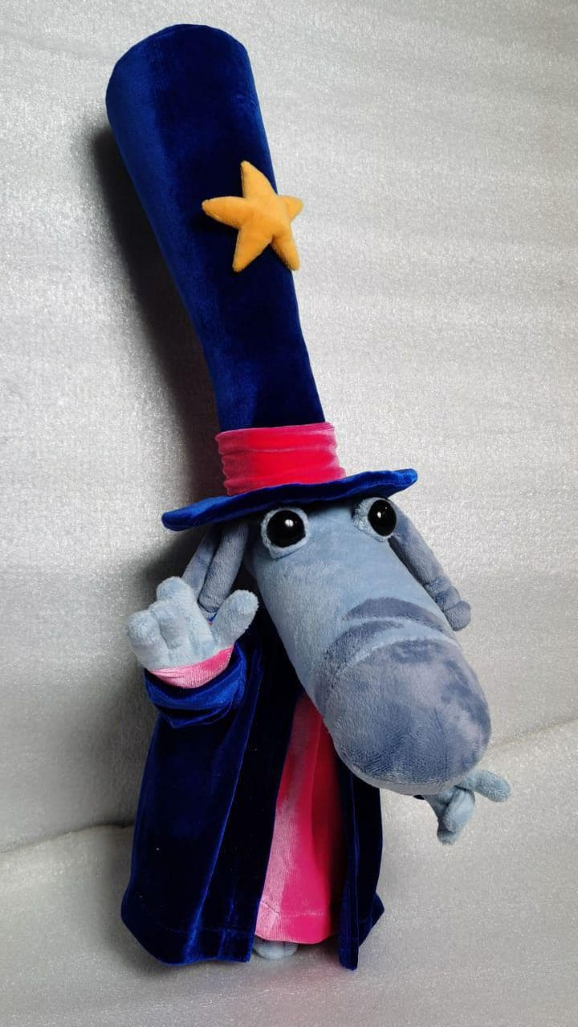 Handmade Rayman Magician plush waving one hand, royal blue velvet coat over a pink shirt, made to order
