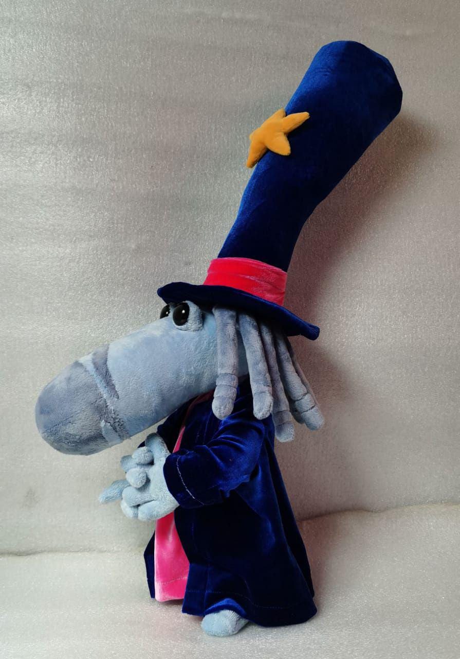 Rayman Magician plush, hat and hair Handmade Rayman Magician plush with grey-blue yarn hair and a pink band on his tall velvet star hat, made to order