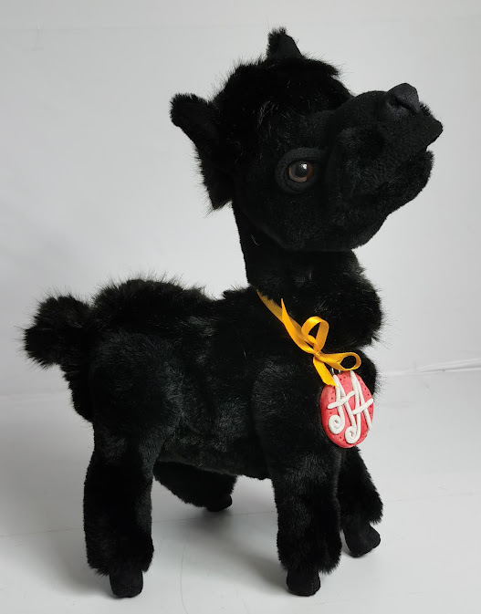 Realistic black llama plush, sewn by hand to order Realistic black llama plush with brown eyes and a short fluffy tail, sewn by hand to order from a photo