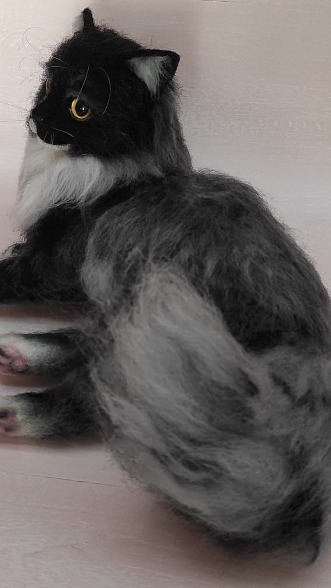 Long-haired cat plush with streaky smoky grey faux fur on its back and a black head, made to order