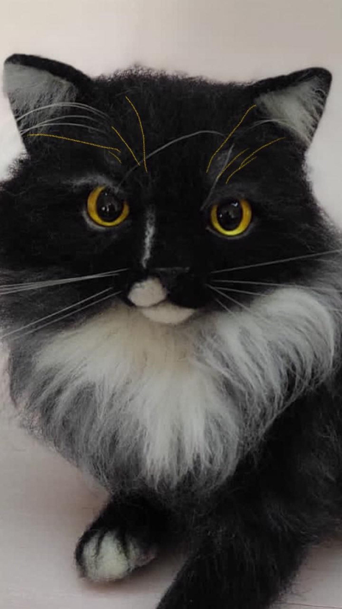 Handmade cat plush face with a thin white nose stripe, amber eyes and white whiskers, made to order