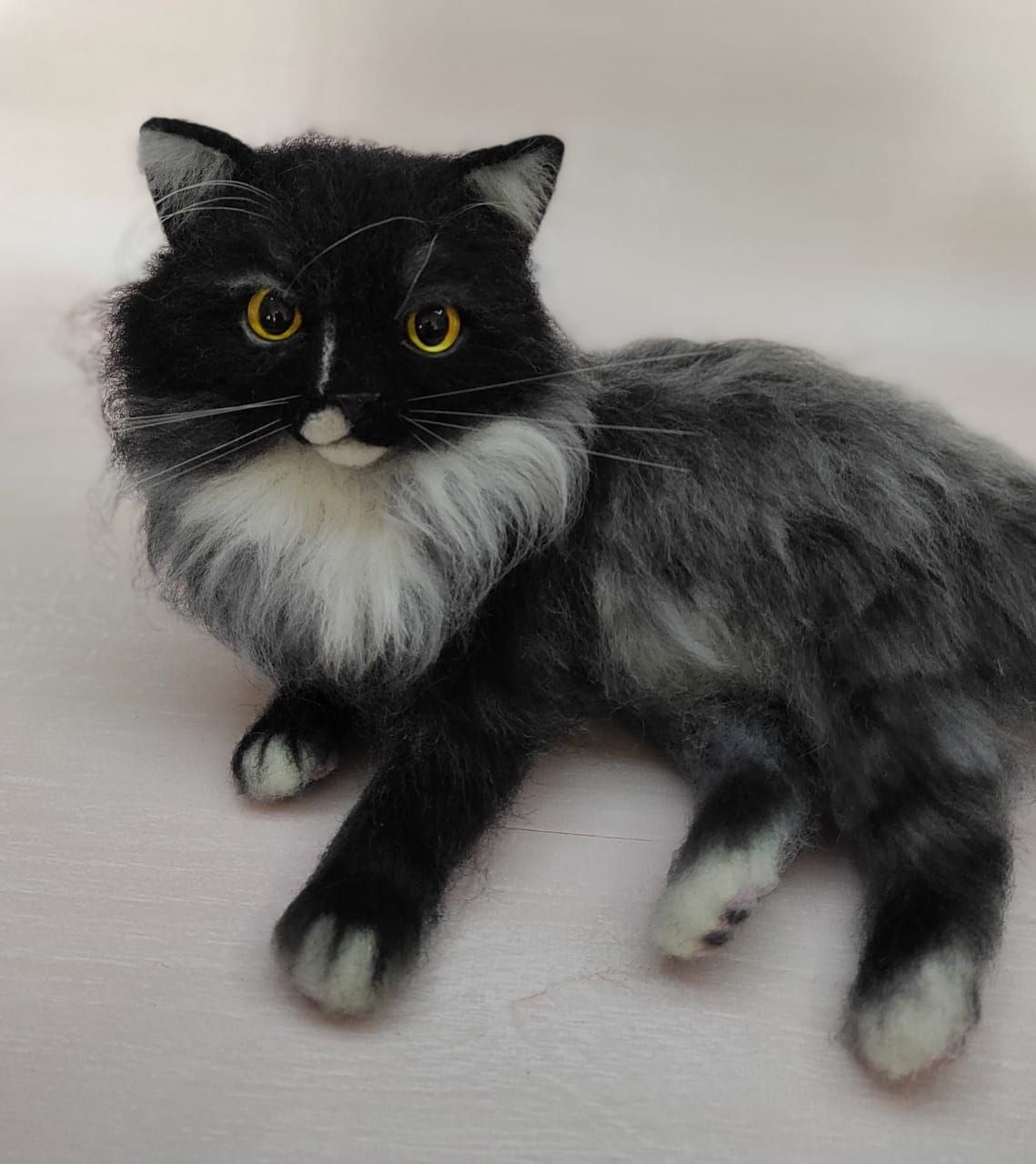 Realistic cat plush with white-tipped paws Realistic cat plush with a black face, white muzzle spot and white-tipped paws, made to order