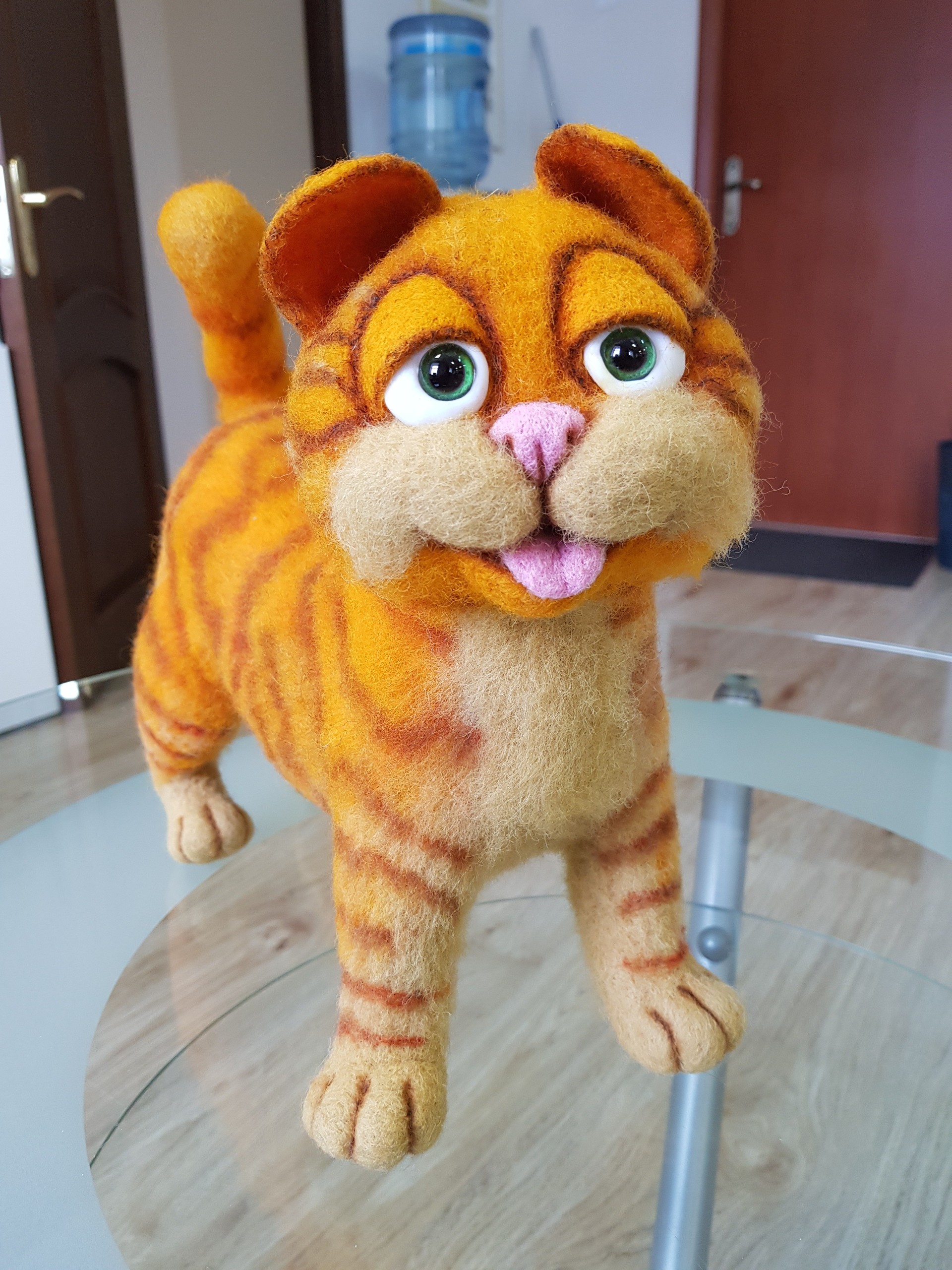 Realistic Garfield plush standing tall Realistic Garfield plush standing with tail raised, sandy muzzle and orange striped body, custom made