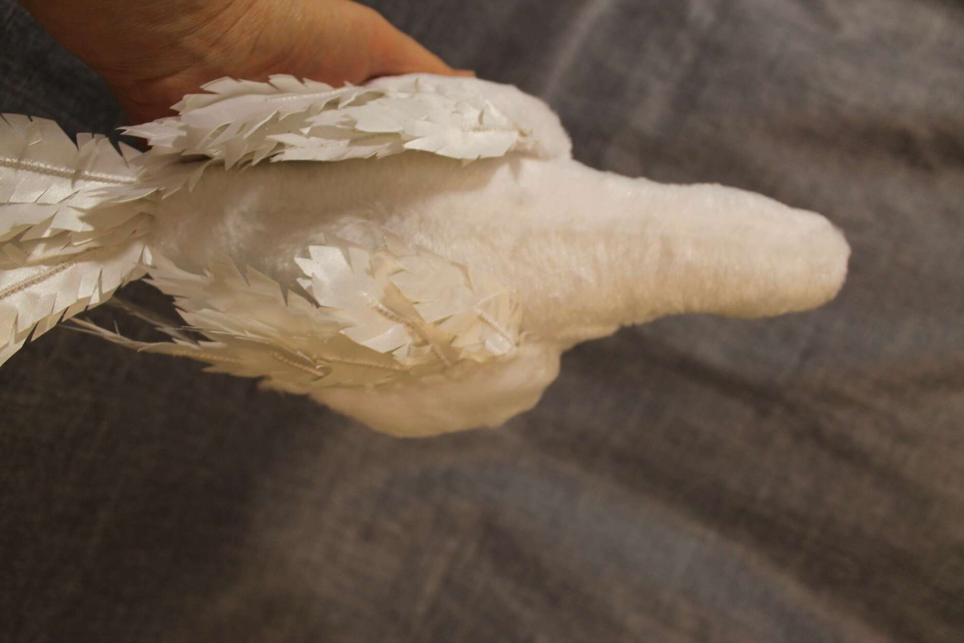 Realistic pigeon plush feather detail Realistic pigeon plush in a hand, layered white feathers with stitched quills on the back, made to order