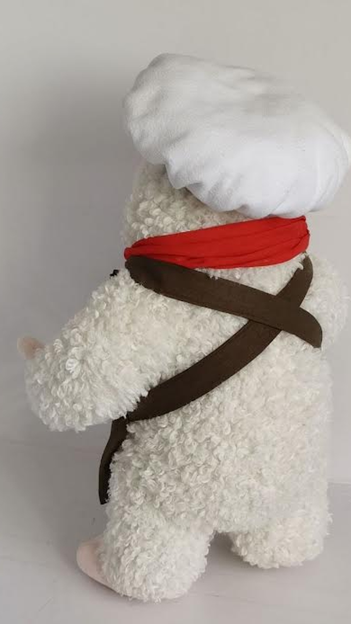 Dumpling restaurant mascot plush from behind: crossed brown apron straps over curly white faux fur, made to order