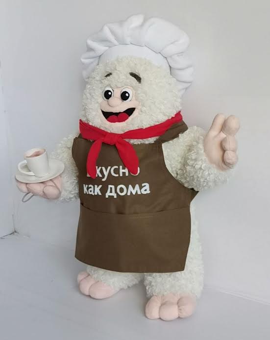 Restaurant mascot plush in a chef hat and apron Restaurant mascot plush: curly white chef in a red neckerchief and brown apron holding a teacup, made to order