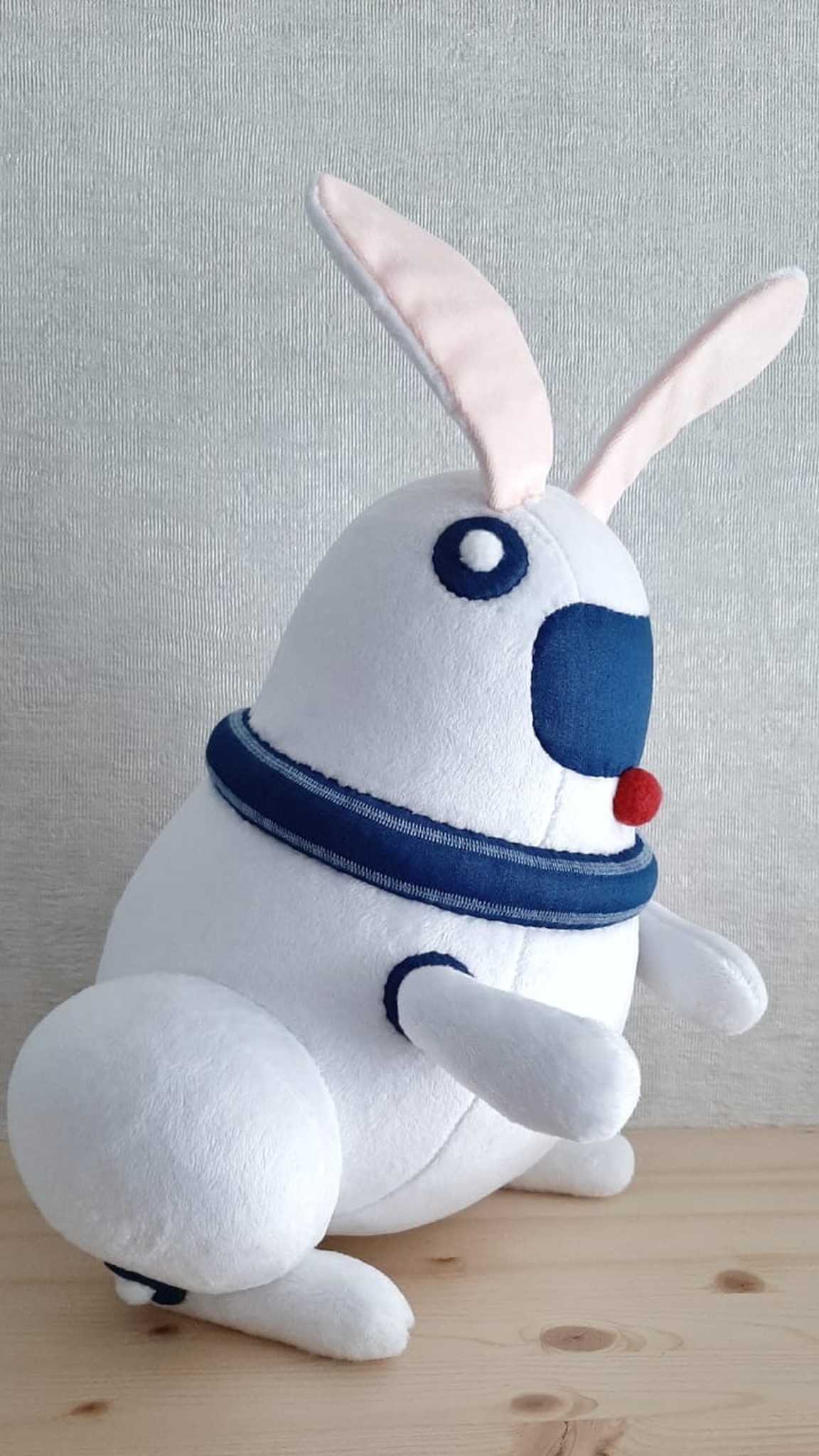 Robot bunny plush with a denim blue collar and round side eyes, handmade to order