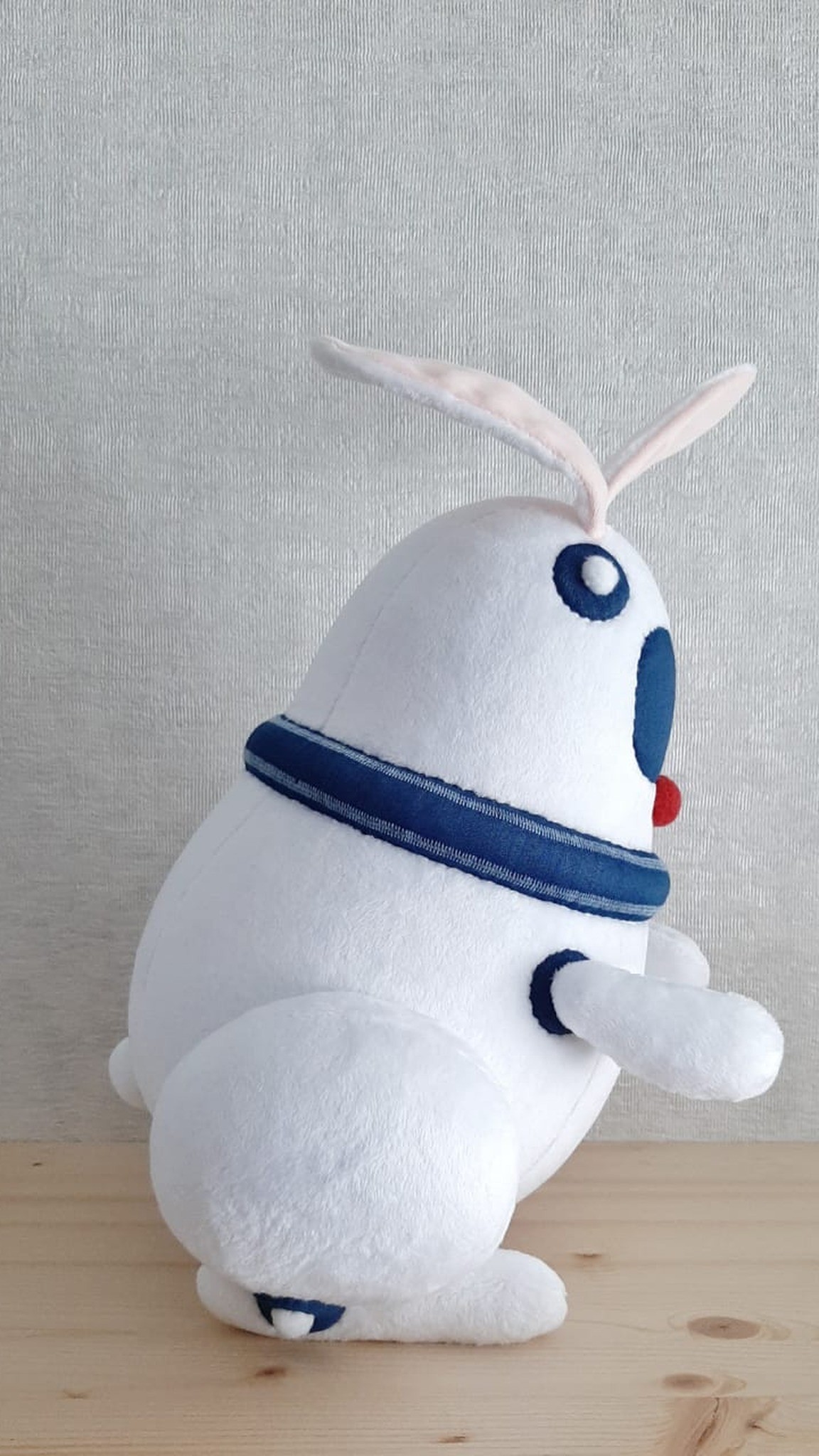 Custom robot bunny plush with an egg-shaped white body, made from a customer picture