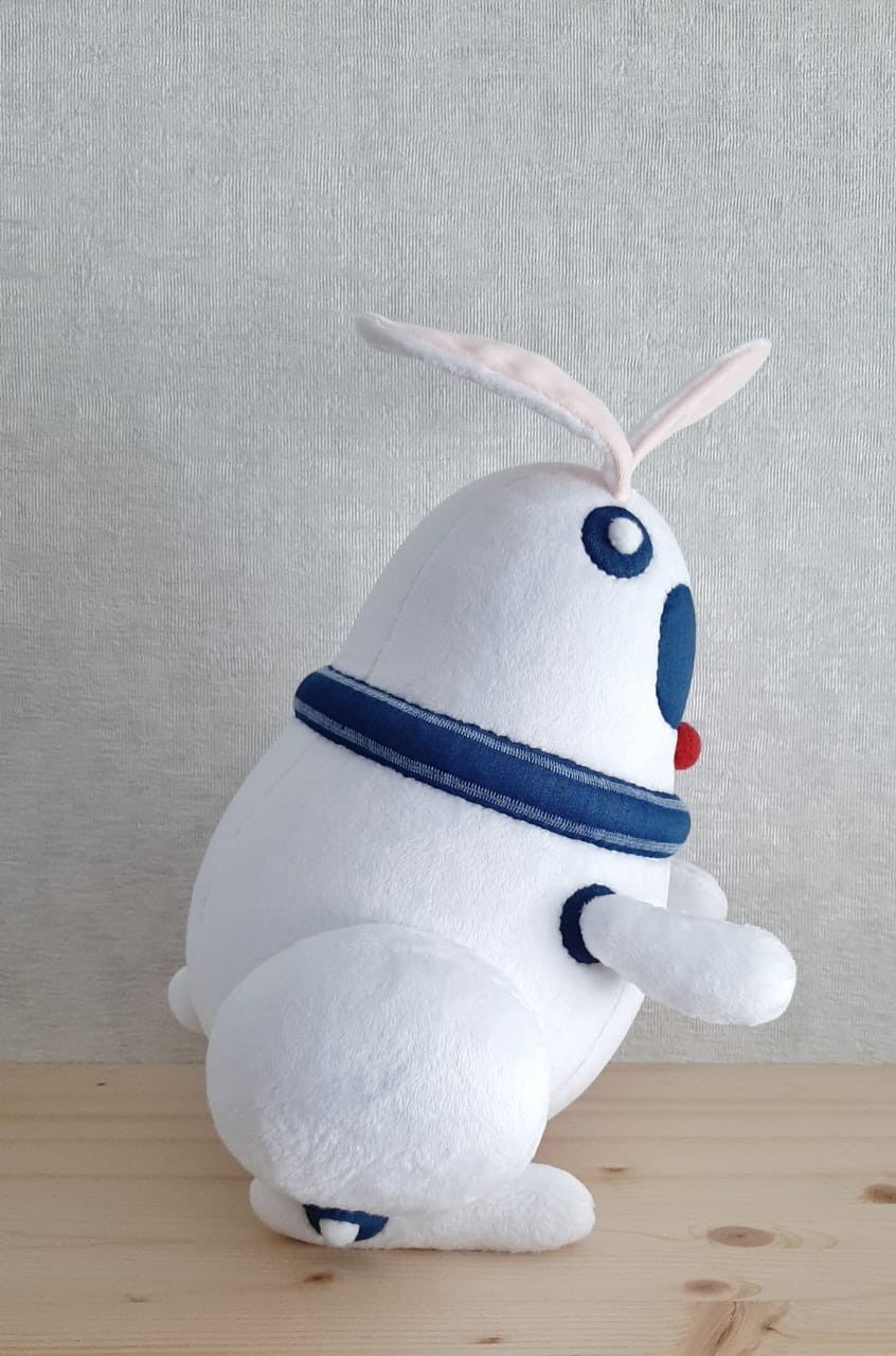 Custom robot bunny plush, egg-shaped body Custom robot bunny plush with an egg-shaped white body and soft folded ears, made from a customer picture