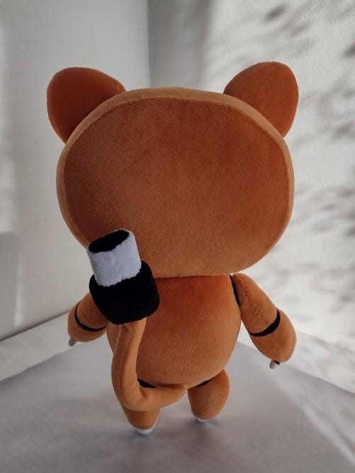 Robot cat plush with charging cable tail Orange robot cat plush with a tail shaped like a charging cable with a black and white plug, made to order