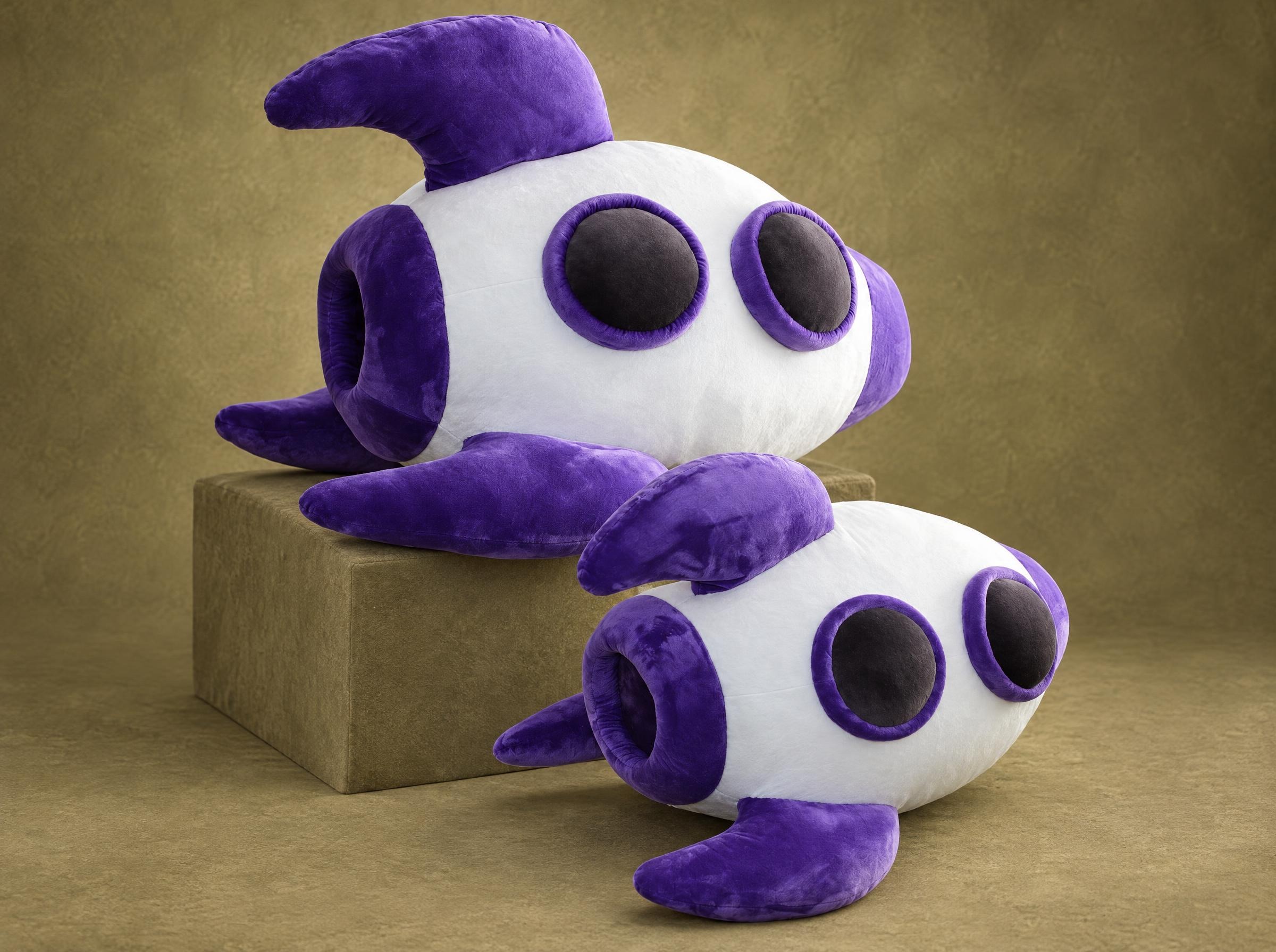 Two big rocket plush toy mascots in white and violet with round portholes, sewn by hand to order