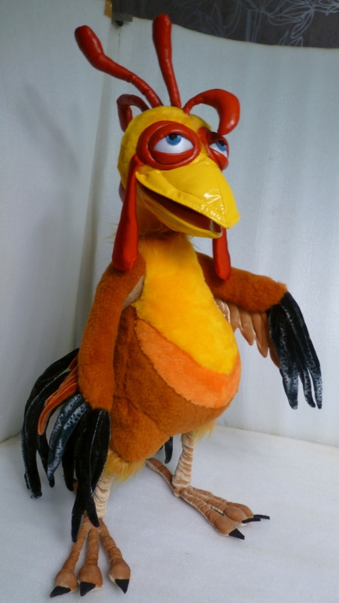 Rooster plush with a curly red comb, open glossy beak, black velvety wing feathers and long legs, sewn to order