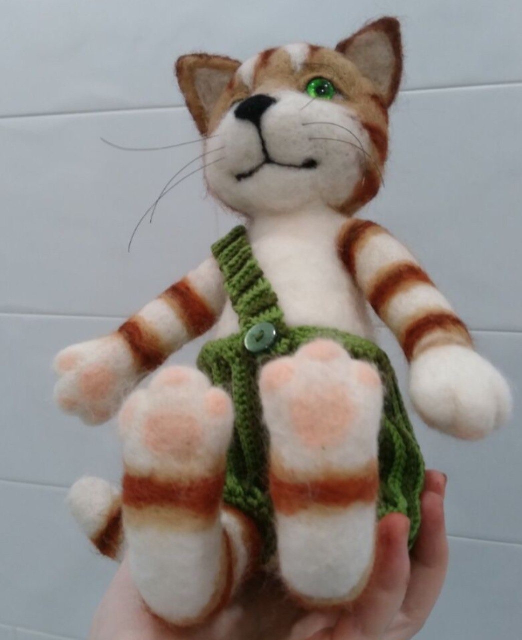 Felted Findus with pink paw pads Felted Findus with pink felted paw pads and striped legs, a handmade Findus cat toy made to order