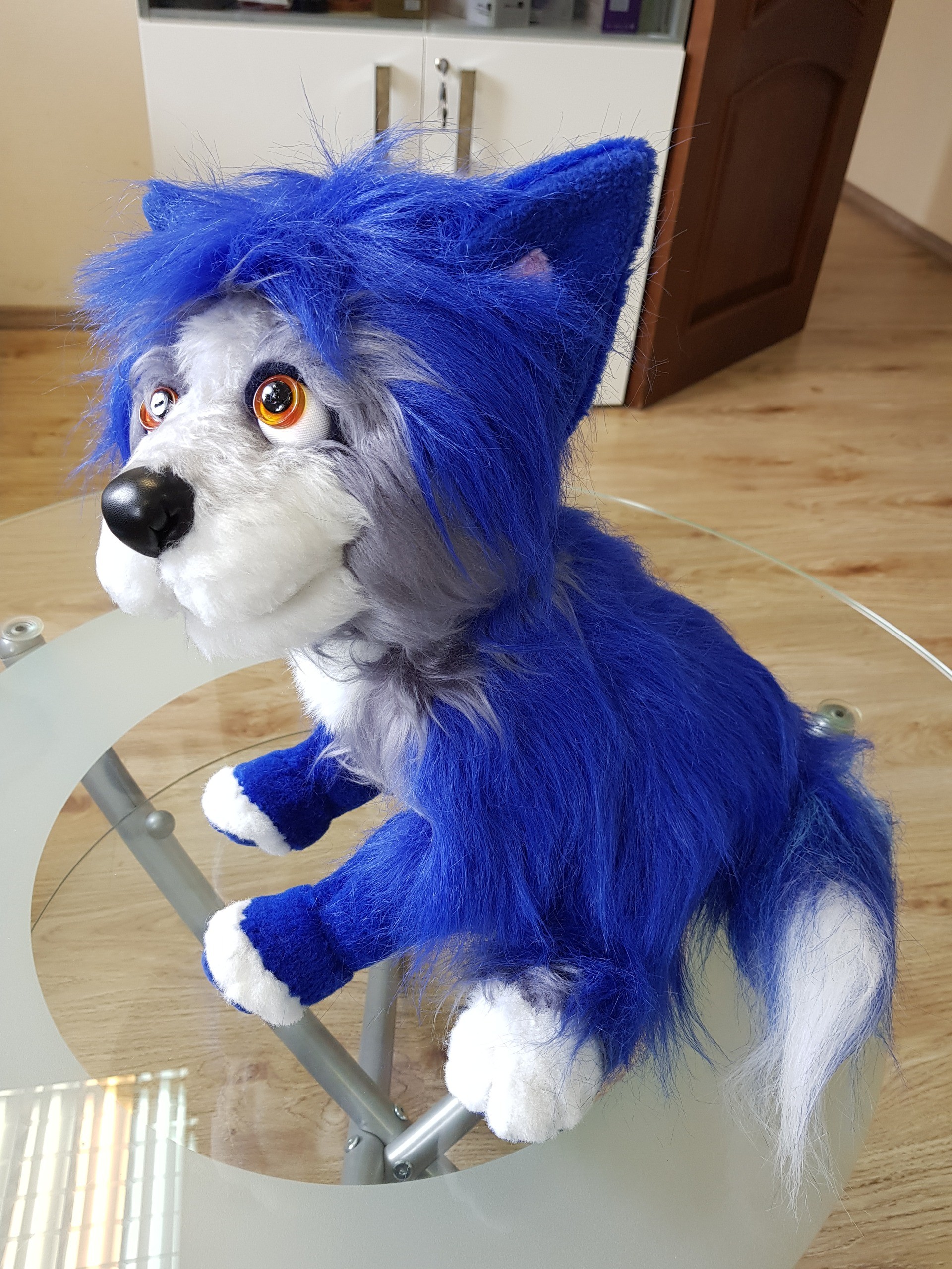 Shaggy blue dog plush with white paws Shaggy blue dog plush sitting with white-tipped paws and tall blue ears, handmade to order