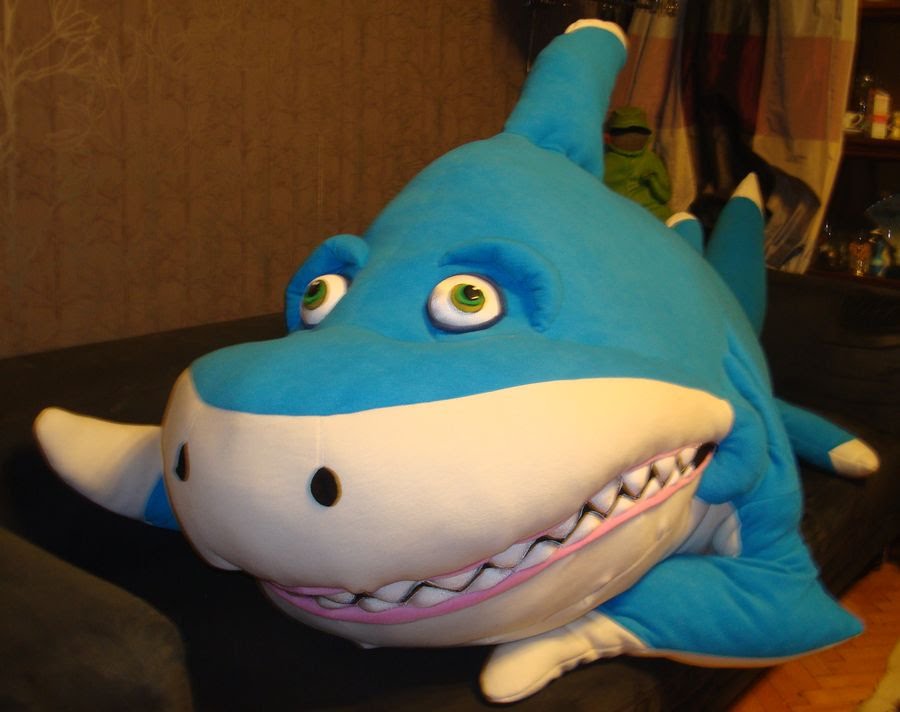 Giant shark stuffed animal with fabric teeth Giant shark stuffed animal with green eyes and a row of white fabric teeth, handmade to order after SeeFood
