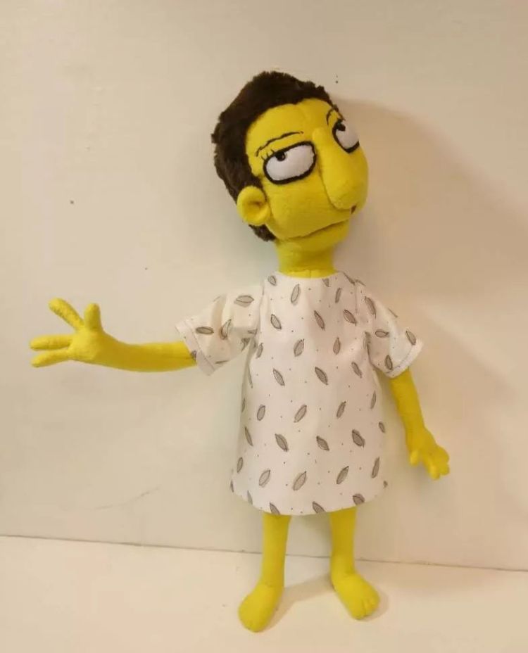Simpsons OC doll in a leaf-print gown Simpsons-style OC plush doll in a white gown with grey leaves, bare yellow feet with stitched toes, custom made