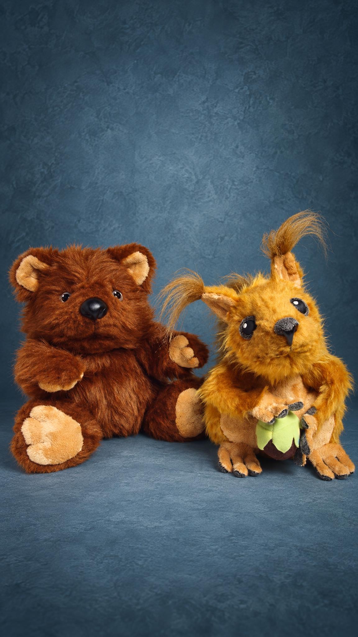 Ginger squirrel plush with ear tufts and a brown hug bear plush, custom made from Skype emoticons